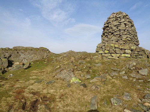 The Cairn on Black Fell summit, the Trig Point can be seen above it