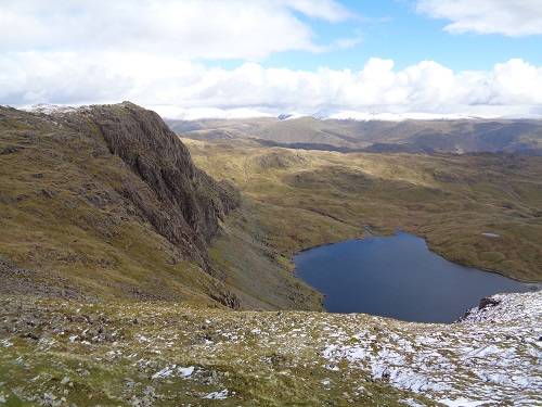 Looking down at Stickle Tarn, Pavey Ark to the left of it