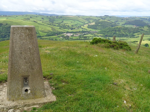 The trig point on Cwm Sanaham Hill looking towards Knucklas