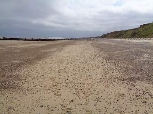 The start of a long day, walking along the beach near Mundesley