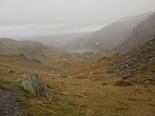 A flurry of snow as I head towards Levers Water