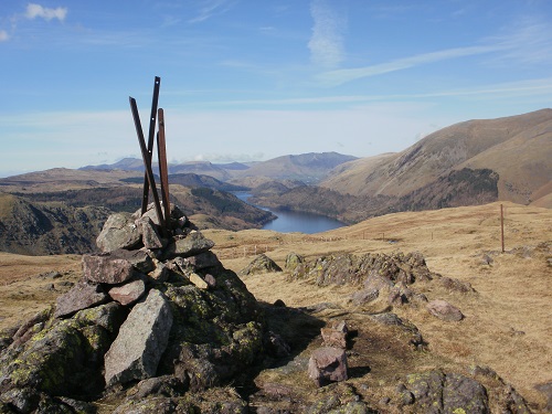 Steel Fell summit cairn with Thrilmere behind