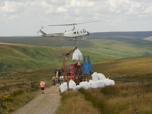 A helicopter at work over the Pennine Way