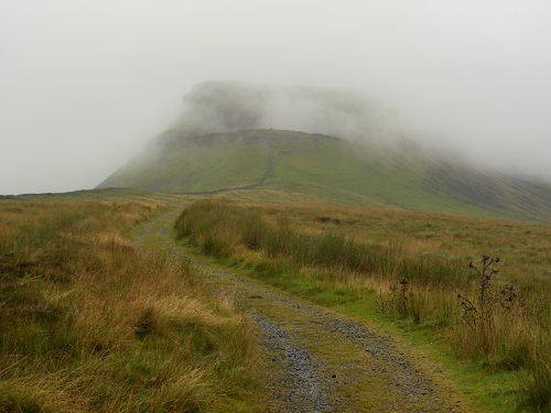 The summit of Pen-Y-Ghent hidden in the mist