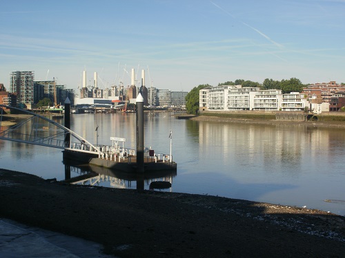 The iconic towers of Battersea Power Station in the distance