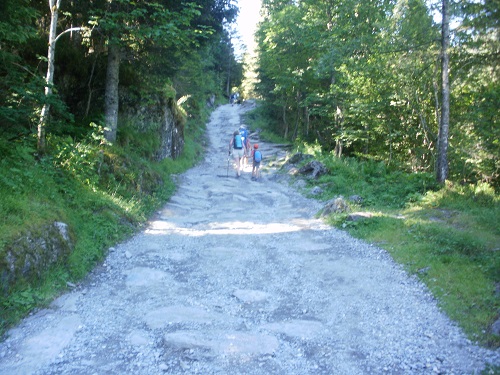 A Roman Road heads up to the Col Du Bonhomme after the Notre Dame de la Gorge Chapel