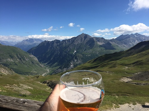 Enjoying a drink and the scenery from the Refuge de la Croix du Bonhomme