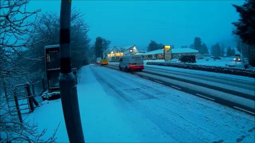 The snow was starting to get deep as i waited for my bus