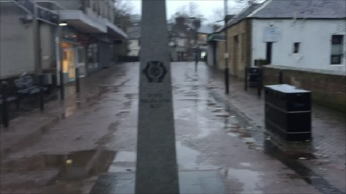 The Obelisk at the start in Milngavie on a wet morning