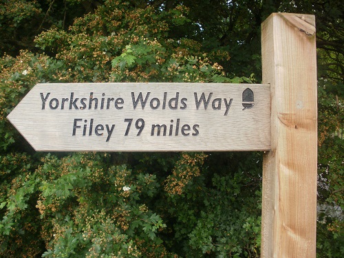 A sign saying 79 miles to Filey at the beginning